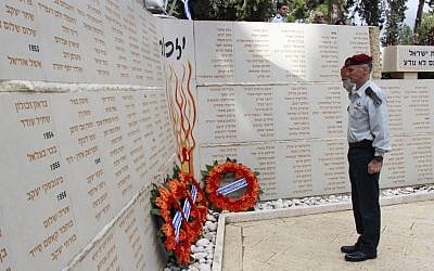 IDF Deputy Chief of Staff Maj.-Gen. Yair Golan salutes a memorial set up for soldiers whose burial places are unknown on Jerusalem's Mount Herzl military cemetery during a ceremony in their honor on March 17, 2016. (Judah Ari Gross/Times of Israel) 