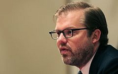 Chris Backemeyer, the Principal Deputy Coordinator for Sanctions Policy at the US Department of State, talks with the journalists about Iran's sanctions in Dubai, United Arab Emirates, Wednesday, March 23, 2016. (AP Photo/Kamran Jebreili)
