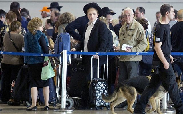 An Israeli airport security guard patrols with a dog in Ben Gurion airport near Tel Aviv, Israel, Tuesday, March 22, 2016. (AP Photo/Ariel Schalit) An Israeli airport security guard patrols with a dog in Ben Gurion airport near Tel Aviv, Israel, Tuesday, March 22, 2016. (AP Photo/Ariel Schalit)