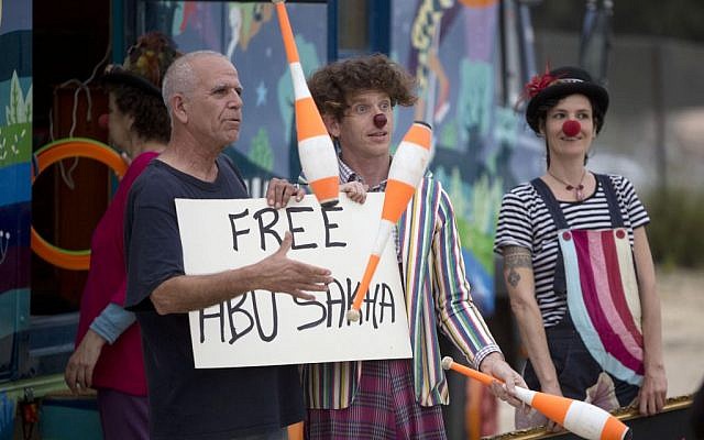 Israeli circus artists protest for the release of Palestinian detainee Abu Sakha, a circus performer on a 6-month administrative detention, outside the Megiddo prison northern Israel, Wednesday, March 2, 2016. (AP Photo/Sebastian Scheiner) Israeli circus artists protest for the release of Palestinian detainee Abu Sakha, a circus performer on a 6-month administrative detention, outside the Megiddo prison northern Israel, Wednesday, March 2, 2016. (AP Photo/Sebastian Scheiner)