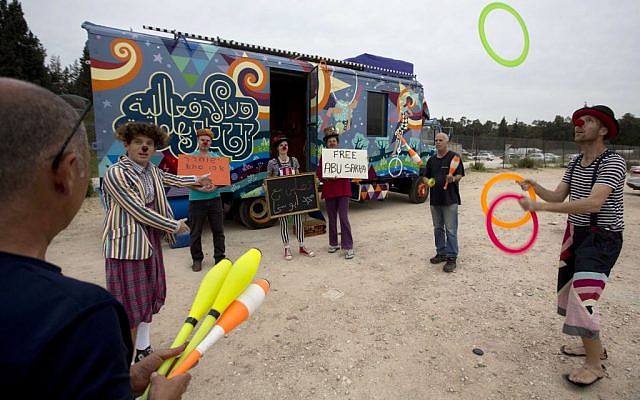Israeli circus artists hold a protest for the release of Palestinian detainee Abu Sakha, a circus performer on a 6-month administrative detention, outside the Megiddo prison northern Israel, Wednesday, March 2, 2016. (AP Photo/Sebastian Scheiner) Israeli circus artists hold a protest for the release of Palestinian detainee Abu Sakha, a circus performer on a 6-month administrative detention, outside the Megiddo prison northern Israel, Wednesday, March 2, 2016. (AP Photo/Sebastian Scheiner)