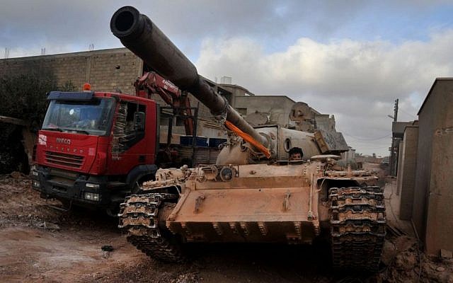 A man loyal to the Libyan armed forces sits in a tank during clashes with Islamic State group militants west of Benghazi, Libya, on Monday, March 7, 2016. (AP/Mohammed el-Shaiky, File) A man loyal to the Libyan armed forces sits in a tank during clashes with Islamic State group militants west of Benghazi, Libya, on Monday, March 7, 2016. (AP/Mohammed el-Shaiky, File)
