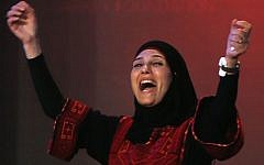 Palestinian primary school teacher Hanan al-Hroub reacts after she won the second annual Global Teacher Prize, in Dubai, United Arab Emirates, March 13, 2016. (AP Photo/Kamran Jebreili, File)