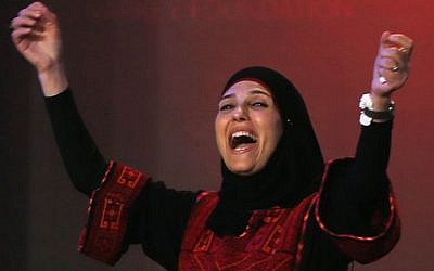 Palestinian primary school teacher Hanan al-Hroub reacts after she won the second annual Global Teacher Prize, in Dubai, United Arab Emirates, March 13, 2016. (AP Photo/Kamran Jebreili, File)