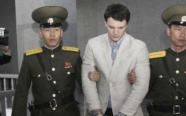 American student Otto Warmbier, center, is escorted at the Supreme Court in Pyongyang, North Korea, March 16, 2016. (AP/Jon Chol Jin) American student Otto Warmbier, center, is escorted at the Supreme Court in Pyongyang, North Korea, March 16, 2016. (AP/Jon Chol Jin)