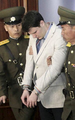 American student Otto Warmbier, center, is escorted at the Supreme Court in Pyongyang, North Korea, March 16, 2016. (AP/Jon Chol Jin) American student Otto Warmbier, center, is escorted at the Supreme Court in Pyongyang, North Korea, March 16, 2016. (AP/Jon Chol Jin)