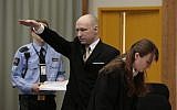 Anders Behring Breivik makes a Nazi gesture as he enters a courtroom in Skien, Norway, on March 15, 2016. (Lise Aserud, NTB scanpix via AP)