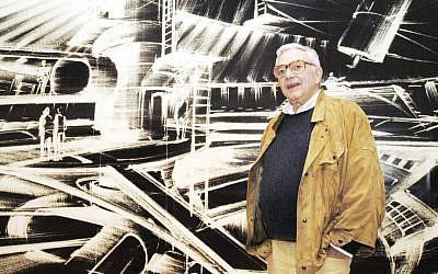 In this Oct. 31, 2002 file photo, German-born British Jewish film designer Ken Adam stands in front of one of his futuristic designs at the exhibition "James Bond - Berlin - Hollywood" in the Martin-Gropius-Bau museum in Berlin. (AP Photo/Jens Meyer, File)