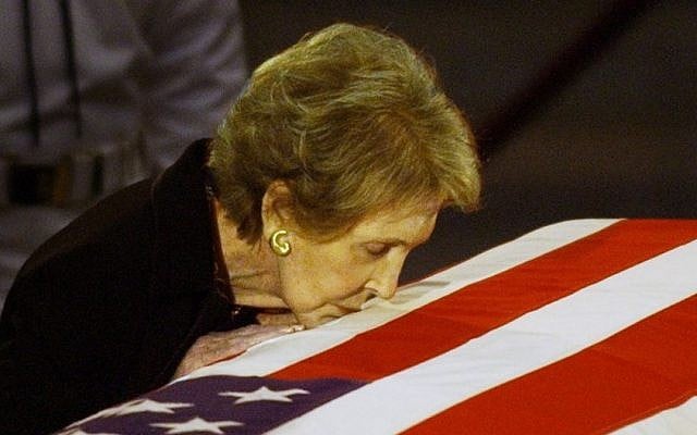 Former first lady Nancy Reagan kisses the casket of her husband former President Ronald Reagan prior to the removal of his remains from the Capitol Rotunda in Washington, June 11, 2004. (AP/Elise Amendola, File) Former first lady Nancy Reagan kisses the casket of her husband former President Ronald Reagan prior to the removal of his remains from the Capitol Rotunda in Washington, June 11, 2004. (AP/Elise Amendola, File)