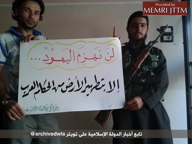 Palestinian IS activists in Syria hold a sigh that says: "We will only defeat the Jews by purging the land of the Arab rulers" (Courtesy: MEMRI) Palestinian IS activists in Syria hold a sigh that says: "We will only defeat the Jews by purging the land of the Arab rulers" (Courtesy: MEMRI)
