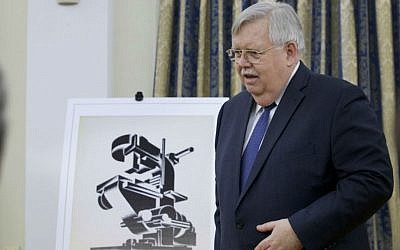 US Ambassador John Tefft speaks at a ceremony at the ambassador's residence in Moscow, Russia, Thursday, March 3, 2016, during which the US returned nearly 30 stolen archival documents from the 18th and 19th centuries to the Russian government. (AP Photo/Ivan Sekretarev)