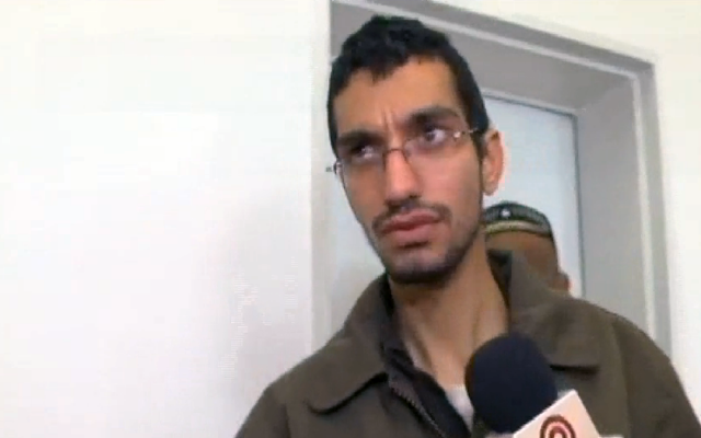 Majd Ouida, a 22-year-old Gazan who Israel has indicted for hacking into IDF drone feeds, traffic cameras and other Israeli computer systems, in a Beersheba court on March 23, 2016. (Screen capture: Channel 10) Majd Ouida, a 22-year-old Gazan who Israel has indicted for hacking into IDF drone feeds, traffic cameras and other Israeli computer systems, in a Beersheba court on March 23, 2016. (Screen capture: Channel 10)