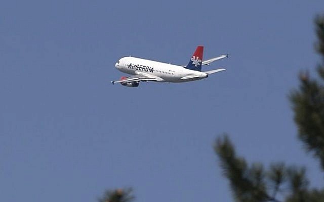 In this photo taken Wednesday, April 15, 2015, an Air Serbia passenger plane flies over Belgrade, Serbia. Serbia's authorities are investigating reports that a cargo package bound for the United States containing two missiles with explosive warheads was found on a passenger flight from Lebanon to Serbia. (AP Photo/Darko Vojinovic) In this photo taken Wednesday, April 15, 2015, an Air Serbia passenger plane flies over Belgrade, Serbia. Serbia's authorities are investigating reports that a cargo package bound for the United States containing two missiles with explosive warheads was found on a passenger flight from Lebanon to Serbia. (AP Photo/Darko Vojinovic)