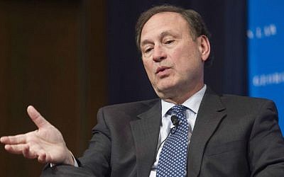 Supreme Court Justice Samuel Alito gestures while speaking at Georgetown University Law Center's third annual Dean's Lecture to the Graduation Class, in Washington, Tuesday, February 23, 2016. (AP Photo/Cliff Owen)
