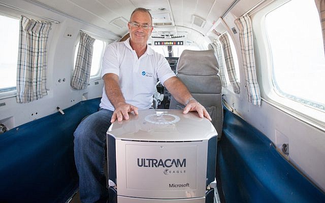 Udi Friedlander with Ofek's an advanced optical remote-sensing system (Dana Friedlander)