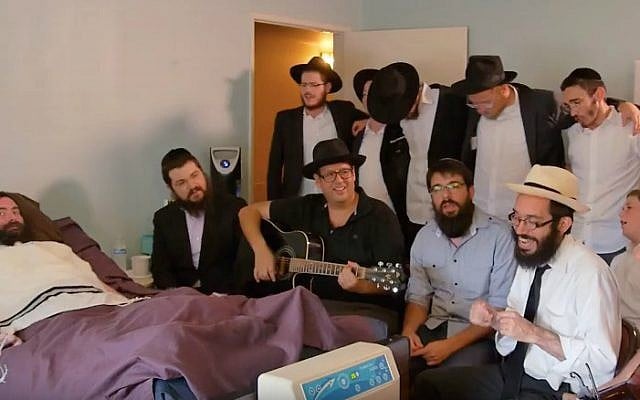 Musical friends sing tribute to Yitzi Hurwitz, a Chabad emissary stricken with ALS. (YouTube)