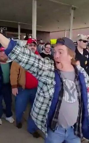 Donald Trump supporter shout, 'Go to Auschwitz!' following a rally for the leading Republican candidate on March 12, 2016. (Screen capture: Sakir Khader/Twitter) Donald Trump supporter shout, 'Go to Auschwitz!' following a rally for the leading Republican candidate on March 12, 2016. (Screen capture: Sakir Khader/Twitter)