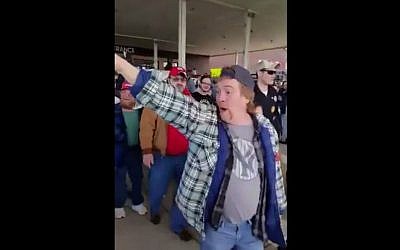 Donald Trump supporter shout, 'Go to Auschwitz!' following a rally for the leading Republican candidate on March 12, 2016. (Screen capture: Sakir Khader/Twitter)