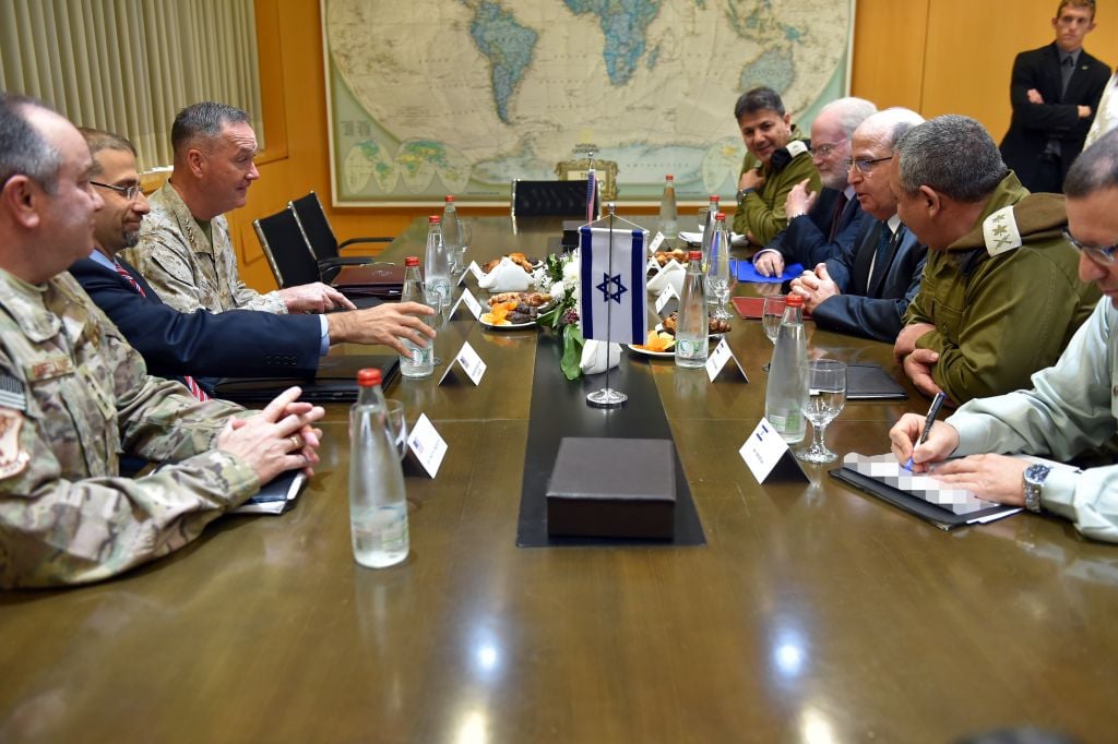 Representatives from the United States, including Chairman of the Joint Chiefs of Staff Joseph Dunford and Ambassador Dan Shapiro, meet with Israeli defense officials, including Defense Minister Moshe Ya'alon and IDF Chief of Staff Gadi Eisenkot, in the Defense Ministry's Tel Aviv headquarters on March 3, 2016. (Ariel Hermoni/Defense Ministry) Representatives from the United States, including Chairman of the Joint Chiefs of Staff Joseph Dunford and Ambassador Dan Shapiro, meet with Israeli defense officials, including Defense Minister Moshe Ya'alon and IDF Chief of Staff Gadi Eisenkot, in the Defense Ministry's Tel Aviv headquarters on March 3, 2016. (Ariel Hermoni/Defense Ministry)