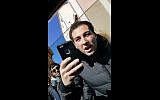 Screen capture of University of Michigan student Jake Croman in a viral YouTube video. (YouTube screen capture)