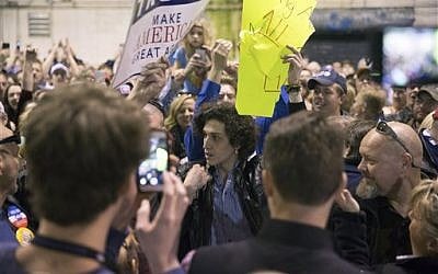 In this Feb. 27, 2016, file photo, a protester has his sign ripped apart by members of the crowd during a rally for Republican presidential candidate Donald Trump at Millington Regional Airport in Millington, Tennessee. (AP Photo/Andrew Harnik, File) In this Feb. 27, 2016, file photo, a protester has his sign ripped apart by members of the crowd during a rally for Republican presidential candidate Donald Trump at Millington Regional Airport in Millington, Tennessee. (AP Photo/Andrew Harnik, File)