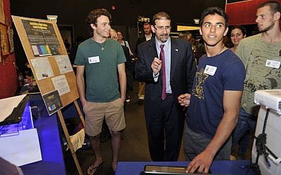 US Ambassador to Israel Dan Shapiro (center) reviews projects at the Gaia Symposium, February 25, 2016 (Amir Ezer)