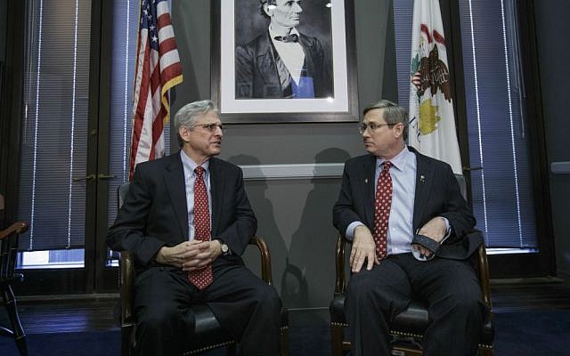 Sen. Mark Kirk, R-Ill., right, meets with Judge Merrick Garland, President Barack Obama’s choice to replace the late Justice Antonin Scalia on the Supreme Court, becoming the only Republican senator to meet the embattled nominee, Tuesday, March 29, 2016, on Capitol Hill in Washington. (AP Photo/J. Scott Applewhite)