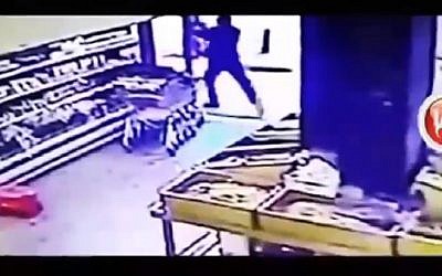 An image of Tel Aviv terrorist Nashat Milhem aired by Hamas militants who hacked into an Israeli TV show on Friday, March 11, 2016 (screen capture: Channel 2)