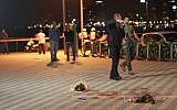 Security forces at the scene of a stabbing attack that killed Taylor Force and injured 10 others at the Jaffa port on March 8, 2016. (Judah Ari Gross/Times of Israel, File)