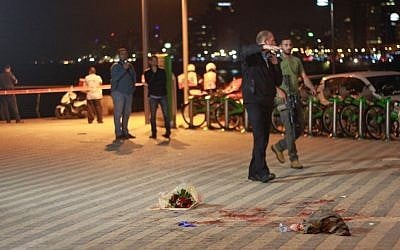 Security forces at the scene of a stabbing attack that killed Taylor Force and injured 10 others at the Jaffa port on March 8, 2016. (Judah Ari Gross/Times of Israel, File)