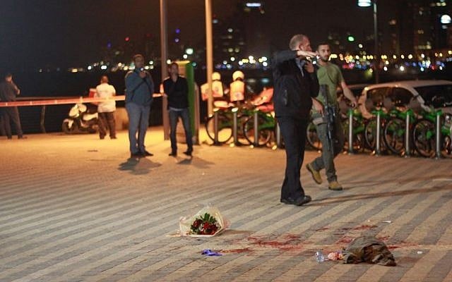 Security forces at the scene of a stabbing attack that killed one person and injured 10 others at the Jaffa port on March 8, 2016. (Judah Ari Gross/Times of Israel, File Security forces at the scene of a stabbing attack that killed one person and injured 10 others at the Jaffa port on March 8, 2016. (Judah Ari Gross/Times of Israel, File)