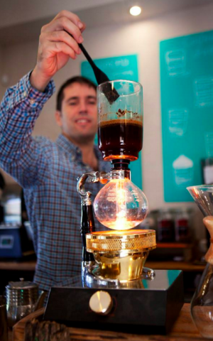 Watching David Strausberg siphon coffee at Kilimanjaro Coffee in Zichron Yaakov (Courtesy Kilimanjaro Coffee) Watching David Strausberg siphon coffee at Kilimanjaro Coffee in Zichron Yaakov (Courtesy Kilimanjaro Coffee)