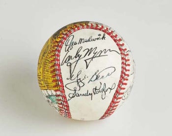 This custom baseball signed by Sandy Koufax and other Hall of Famers, including Yogi Berra, is another prized possession in the Jeff Aeder collection. (Courtesy of Jeff Aeder/JTA) This custom baseball signed by Sandy Koufax and other Hall of Famers, including Yogi Berra, is another prized possession in the Jeff Aeder collection. (Courtesy of Jeff Aeder/JTA)