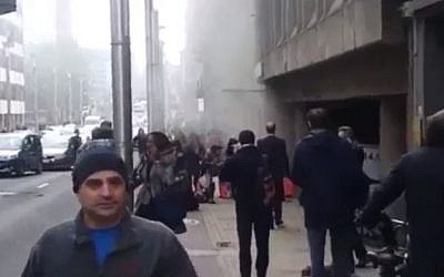 Smoke billows from a metro station in Maalbeek, Brussels after a blast at the site on March 22, 2016 (screen capture: YouTube)