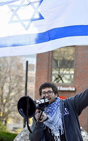 Brandeis University pro-Israel student activist Seth Greenwald agitates during a 'Fuel for Truth' march in November of 2015, in Boston (courtesy) 