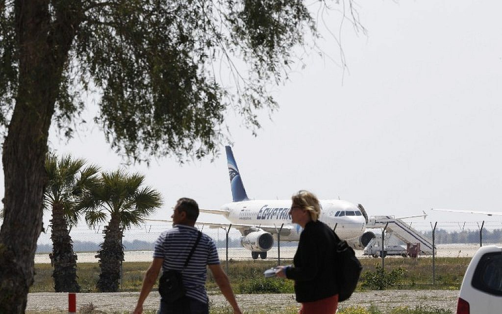 An EgyptAir Airbus A-320 sits on the tarmac of Larnaca airport after it was hijacked and diverted to Cyprus on March 29, 2016 (AFP/Behrouz Mehri)