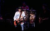Carlos Santana performs (