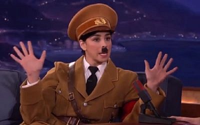 Jewish American comedian Sarah Silverman appears on Conan O'Brien's talk show dressed as Adolf Hitler, on March 10 2016 (screen capture: YouTube)
