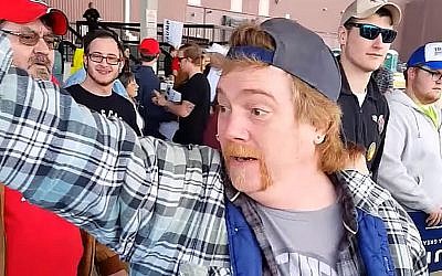 Donald Trump supporter shouts, 'Go to Auschwitz!' following a rally for the leading Republican candidate on March 12, 2016 (screen capture: Sakir Khader/Twitter)