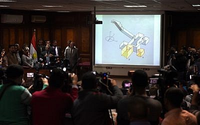 Egypt's Antiquities Minister Mamduh Damati (3L) speaks during a press conference at the antiquities ministry in Cairo about radar scans of the tomb of pharaoh Tutankhamun in the ancient necropolis of Luxor which show a "90 percent" chance of two hidden chambers, possibly containing organic material, March 17, 2016.  / AFP / MOHAMED EL-SHAHED