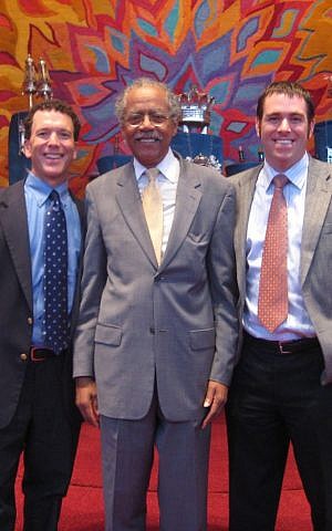 Rabbi Greenstein, Rev. Samuel 'Billy' Kyles, who held Dr. Martin Luther King as he lay dying in 1968, and Rabbi Adam Grossman share a moment in Temple Israel's sanctuary, 2008. (courtesy)