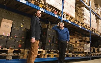 Pieter van Oordt, left, with his brother, Roger, at the Israel Products Center in Nijkerk, the Netherlands, February 19, 2016. (Cnaan Liphshiz/JTA)