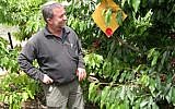 Dr. Nimrod Israeli, CEO of Biofeed, next to one of the company's decoys (Courtesy)