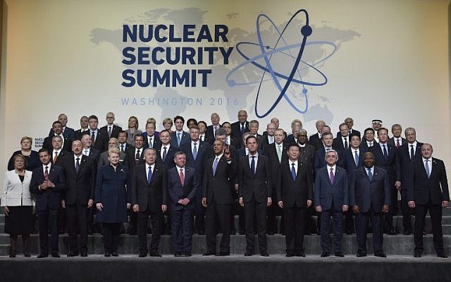 US President Barack Obama flashes a peace sign as he and other world leaders take part in the Nuclear Security Summit family photo at the Walter E. Washington Convention Center on April 1, 2016 in Washington, DC. (AFP / MANDEL NGAN) US President Barack Obama flashes a peace sign as he and other world leaders take part in the Nuclear Security Summit family photo at the Walter E. Washington Convention Center on April 1, 2016 in Washington, DC. (AFP / MANDEL NGAN)