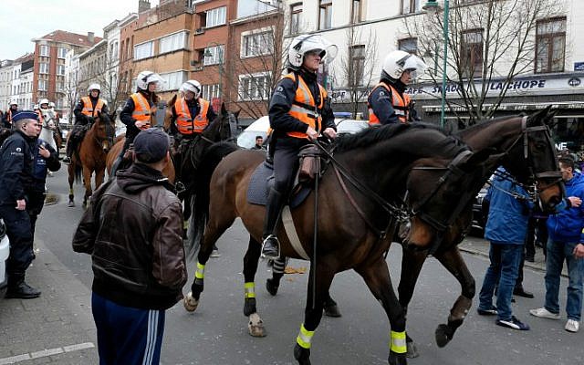 Local youth and police on horseback gather in the street of Molenbeek-Saint-Jean in Brussels, on April 2, 2016. (Nicolas Maeterlinck/Belga/AFP) Local youth and police on horseback gather in the street of Molenbeek-Saint-Jean in Brussels, on April 2, 2016. (Nicolas Maeterlinck/Belga/AFP)