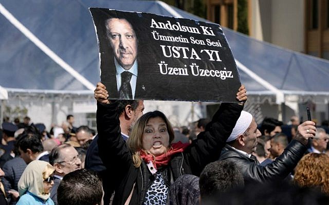 People cheer as Turkey's President Recep Tayyip Erdogan speaks during the inauguration of the Diyanet Islamic Cultural Center in Lanham, Maryland on April 2, 2016. (Olivier Douliery/AFP) People cheer as Turkey's President Recep Tayyip Erdogan speaks during the inauguration of the Diyanet Islamic Cultural Center in Lanham, Maryland on April 2, 2016. (Olivier Douliery/AFP)