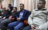 The father, center, of 21-year-old Palestinian Abdul Fatah al-Sharif, who was shot in the head and killed by an Israeli soldier on March 24 as he lay on the ground while apparently seriously wounded from earlier gunshot wounds, listens on during a press conference at the governor's office in the West Bank town of Hebron on April 4, 2016.  (AFP / HAZEM BADER)