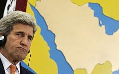 US Secretary of State John Kerry sits in front of a map of Saudi Arabia and the Persian Gulf during a joint press conference with Saudi Arabia's foreign minister in the Bahraini capital of Manama, on April 7, 2016. (AFP/Jonathan Ernst/Pool)