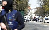 Illustrative photo of a Belgian police officers standing guard in a street in Etterbeek, Brussels, on April 9, 2016, as part of the investigation into the November 13, 2015, Paris attacks in which 130 died; and the March 22, 2016, attacks in Brussels, which left 32 dead. (AFP/Thierry Charlier)