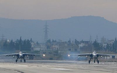 This file photo taken on December 16, 2015 shows Two Russian Sukhoi Su-25 bombers at the Russian Hmeimim military base in Latakia province, in the northwest of Syria. (AFP Photo/Paul Gypteau) This file photo taken on December 16, 2015 shows Two Russian Sukhoi Su-25 bombers at the Russian Hmeimim military base in Latakia province, in the northwest of Syria. (AFP Photo/Paul Gypteau)